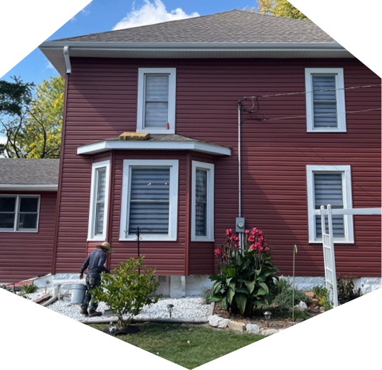 Gutters and siding installed by the professionals at Resolve Roofing, siding installation