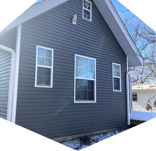 Gutters and siding installed by the professionals at Resolve Roofing
